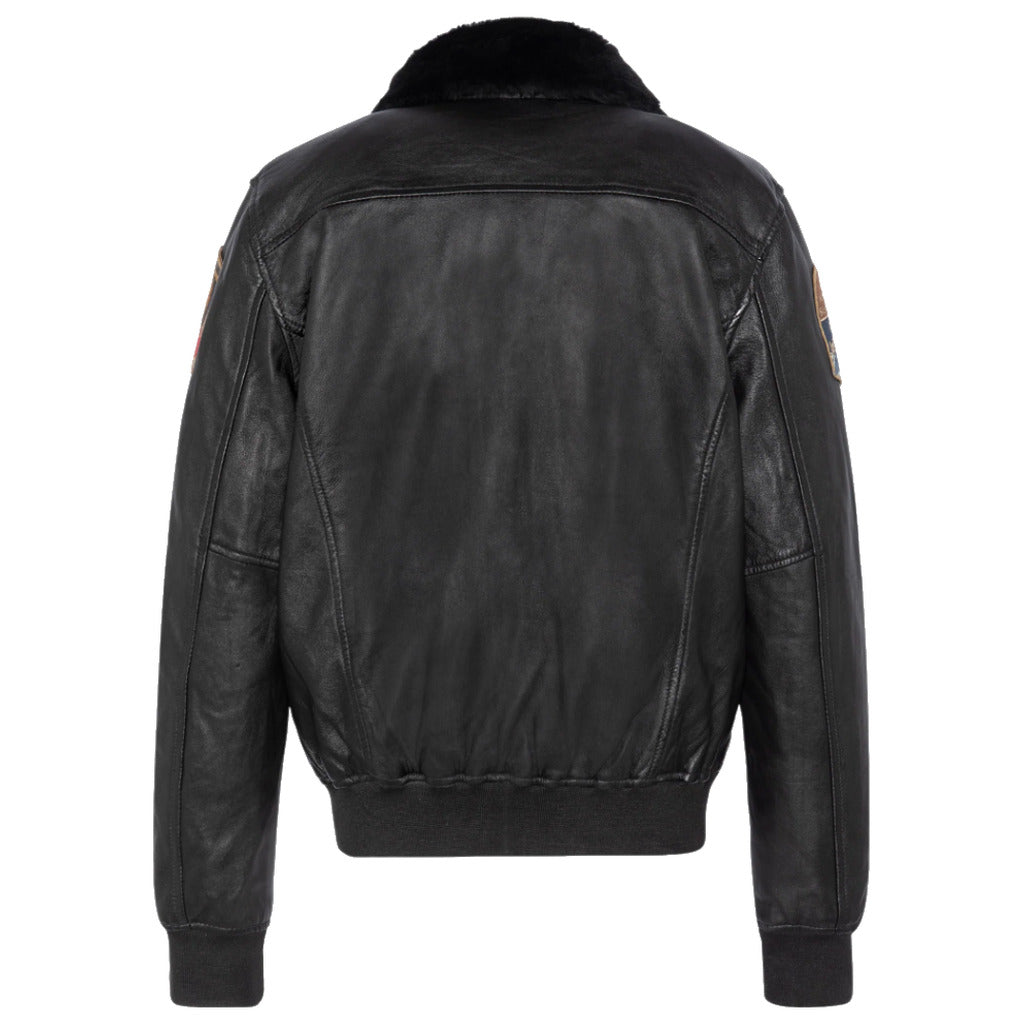 Schott NYC black lambskin bomber jacket with removable fur collar and embroidered patches.